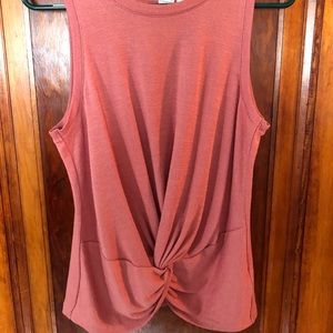 Mauve tank top, slightly used very good condition , size medium